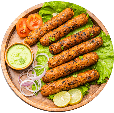 seekh kabab served in plate with green chutney 2022 01 20 01 53 00 utc isolated.png